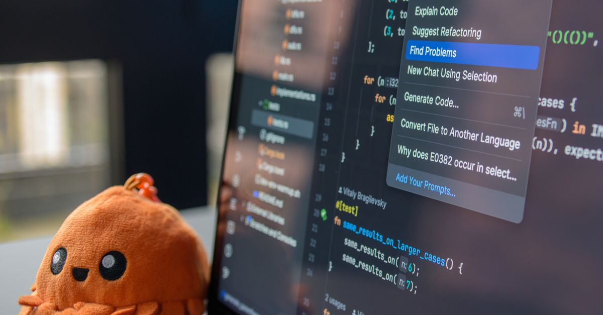 Developer writing code on screen